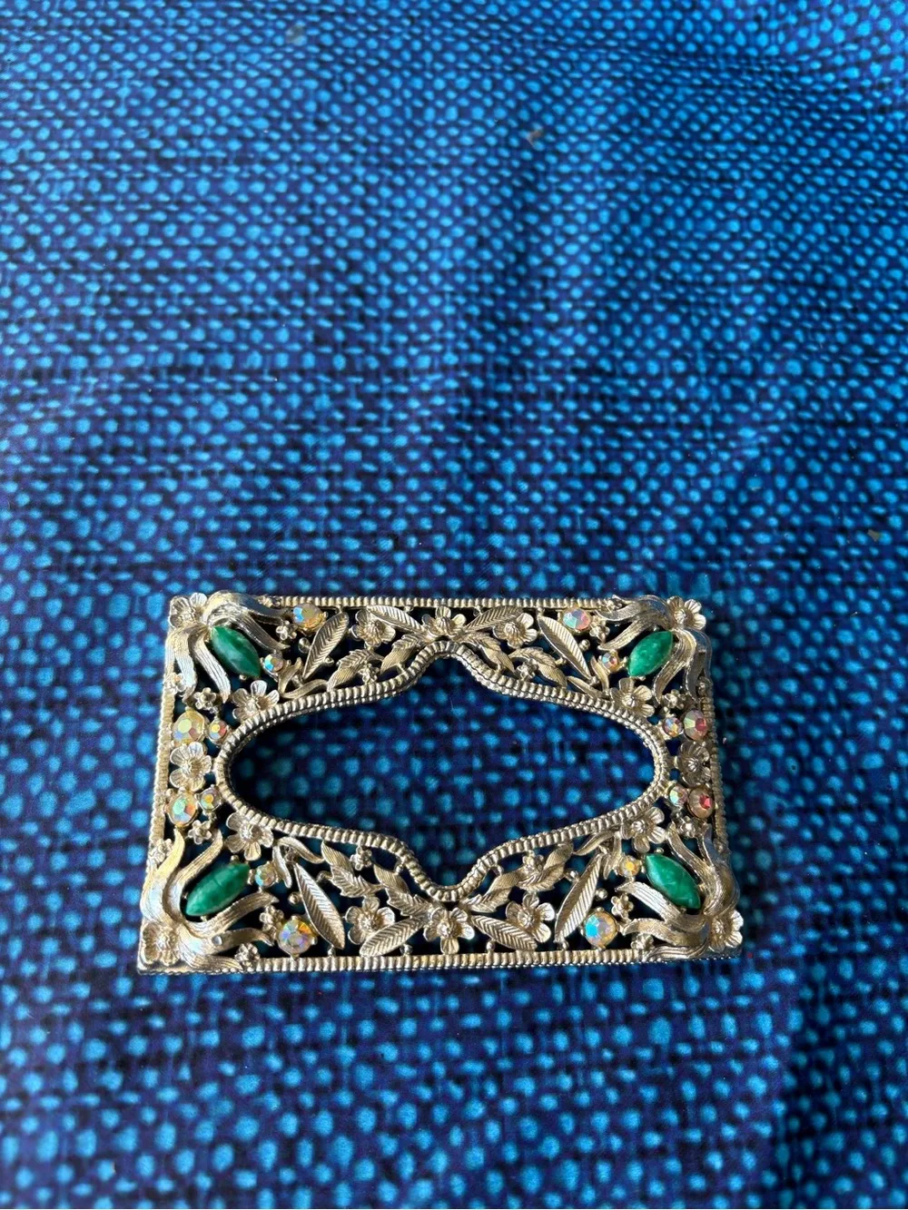Ornate Silver-Tone Rectangular Brooch with Green Gem Accents